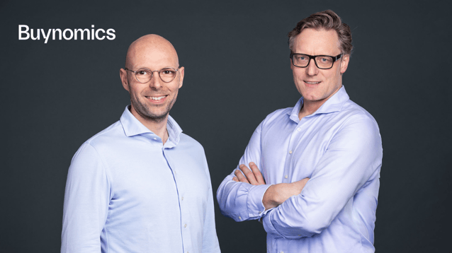 Photo of Buynomics founders Sebastian and Ingo celebrating the company’s $30M Series B funding round