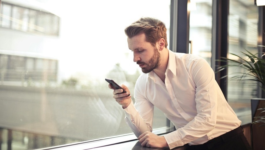 Man looking at mobile phone