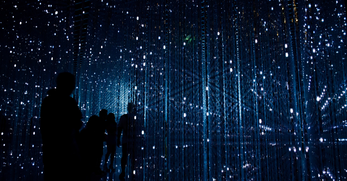 People walking through design exhibit