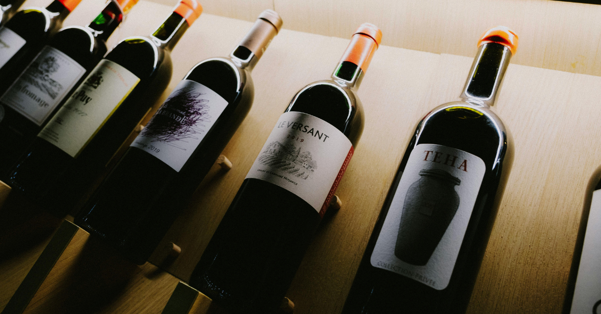 Wine bottles on display - header image for How to Leverage Behavioral Pricing and Win Customers
